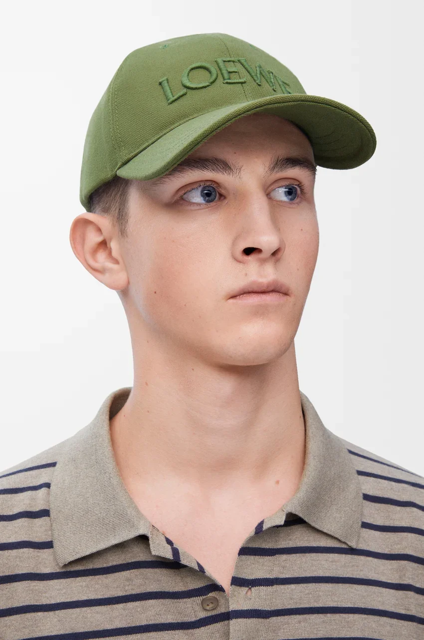 green Loewe Canvas cap.