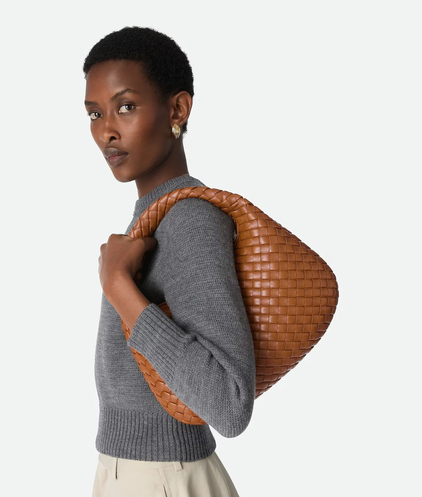 3. Luxury lifestyle shot with the Bottega Veneta Veneta Maxi bag.