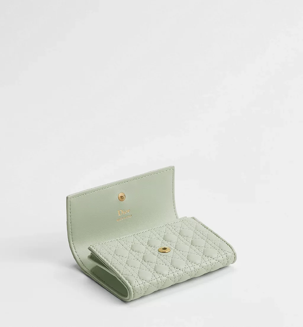 Small luxury designer wallets including Dior Promenade Glycine and Baby Bow