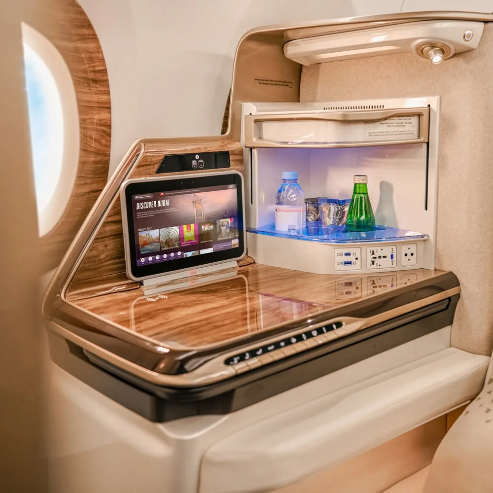 Premium spacious seating and fine dining service on Emirates cheap Business Class flight tickets