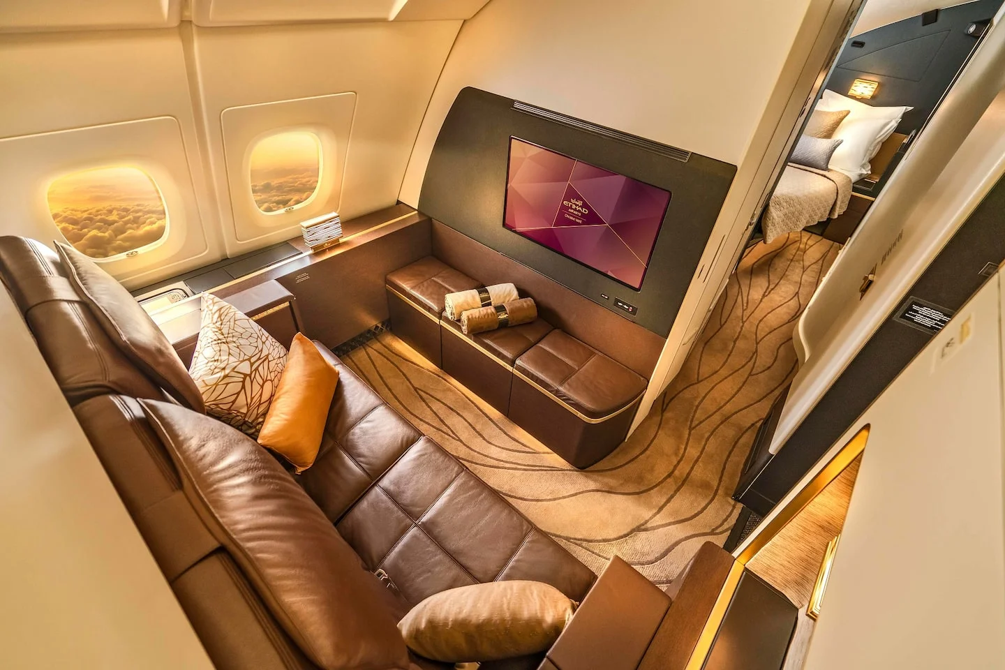 Private living room with leather sofa in Etihad The Residence