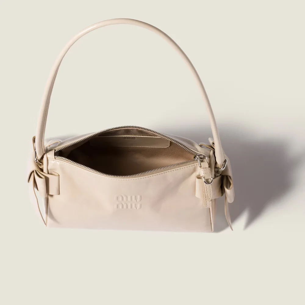 กระเป๋า Miu Miu Shiny Leather Pouch และ DiorTravel Nomad Pouch รุ่นฮิต