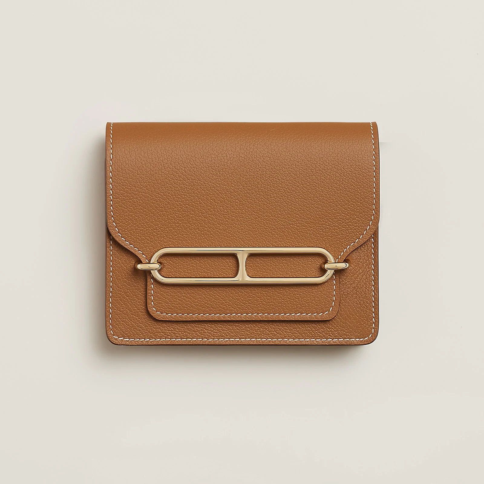 Hermès Constance Slim wallet in lucky signature orange