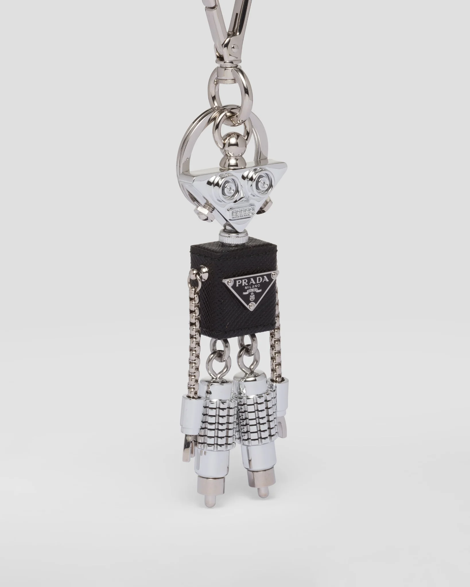 Prada Robot keychain in metal and luxury Saffiano leather design