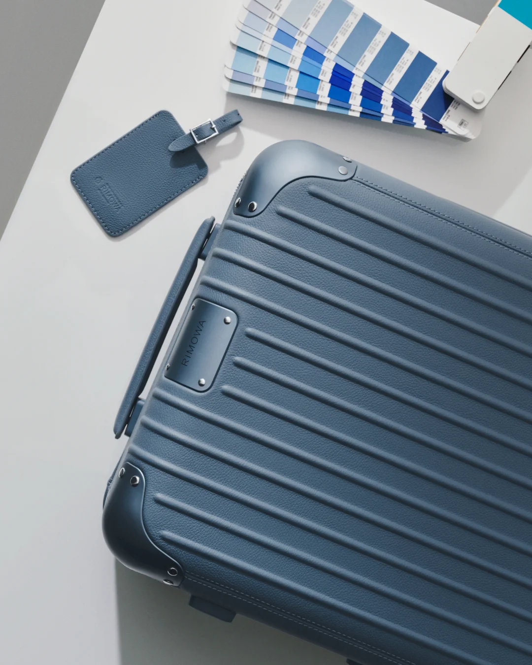 Premium travel aesthetic with the new RIMOWA blue collection
